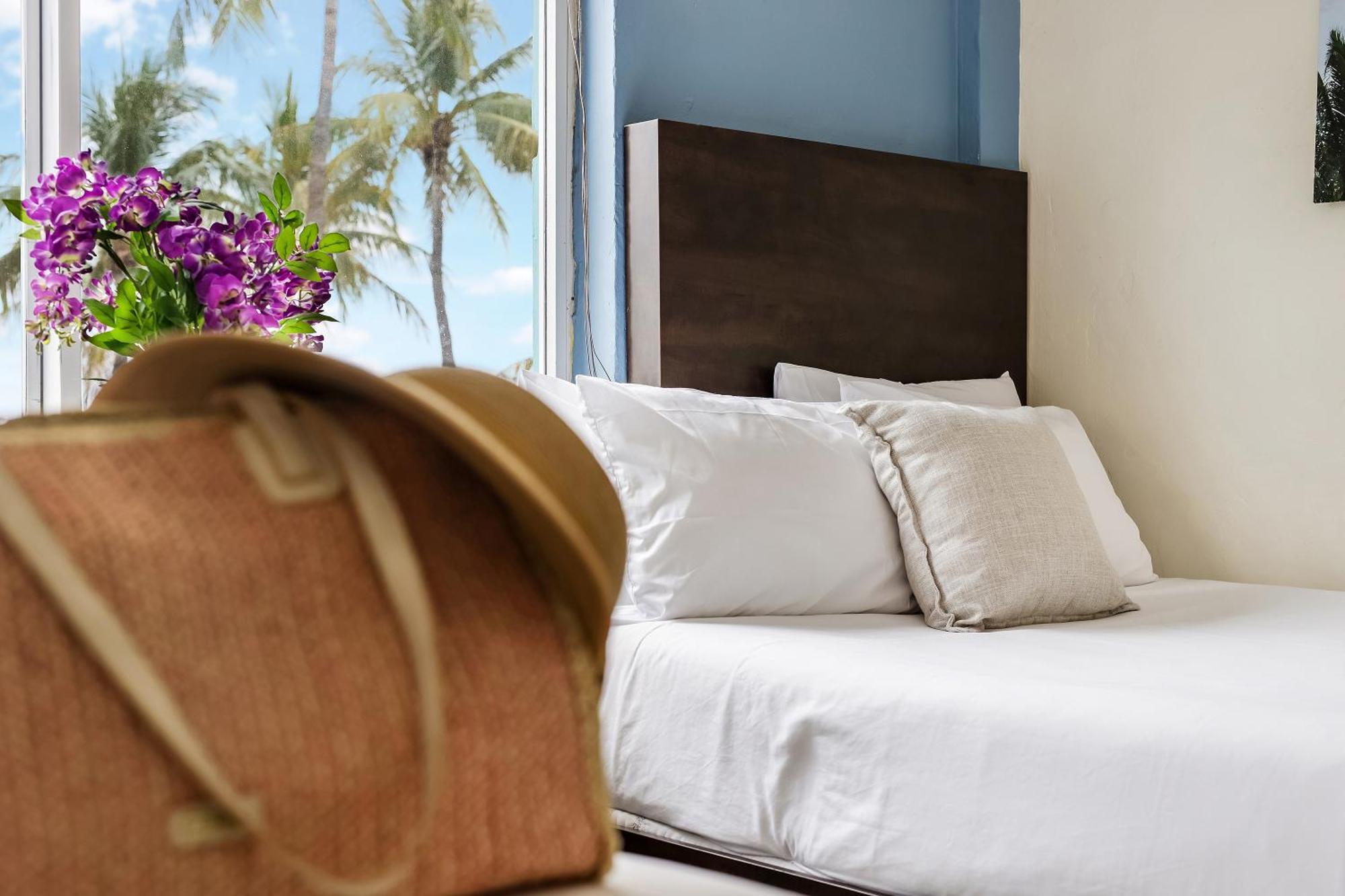 Deluxe Room Two double Beds Suite Ocean View Self Check