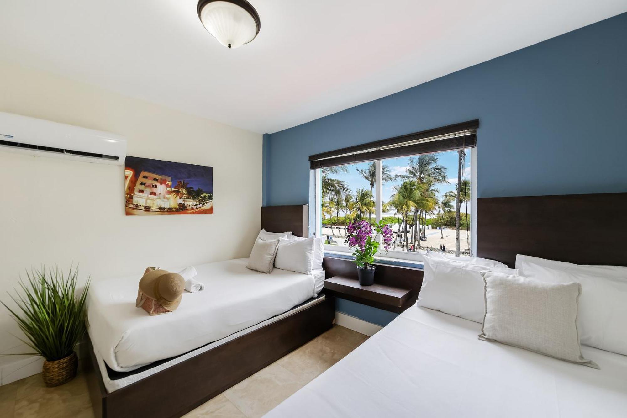 Deluxe Room Two double Beds Suite Ocean View Self Check