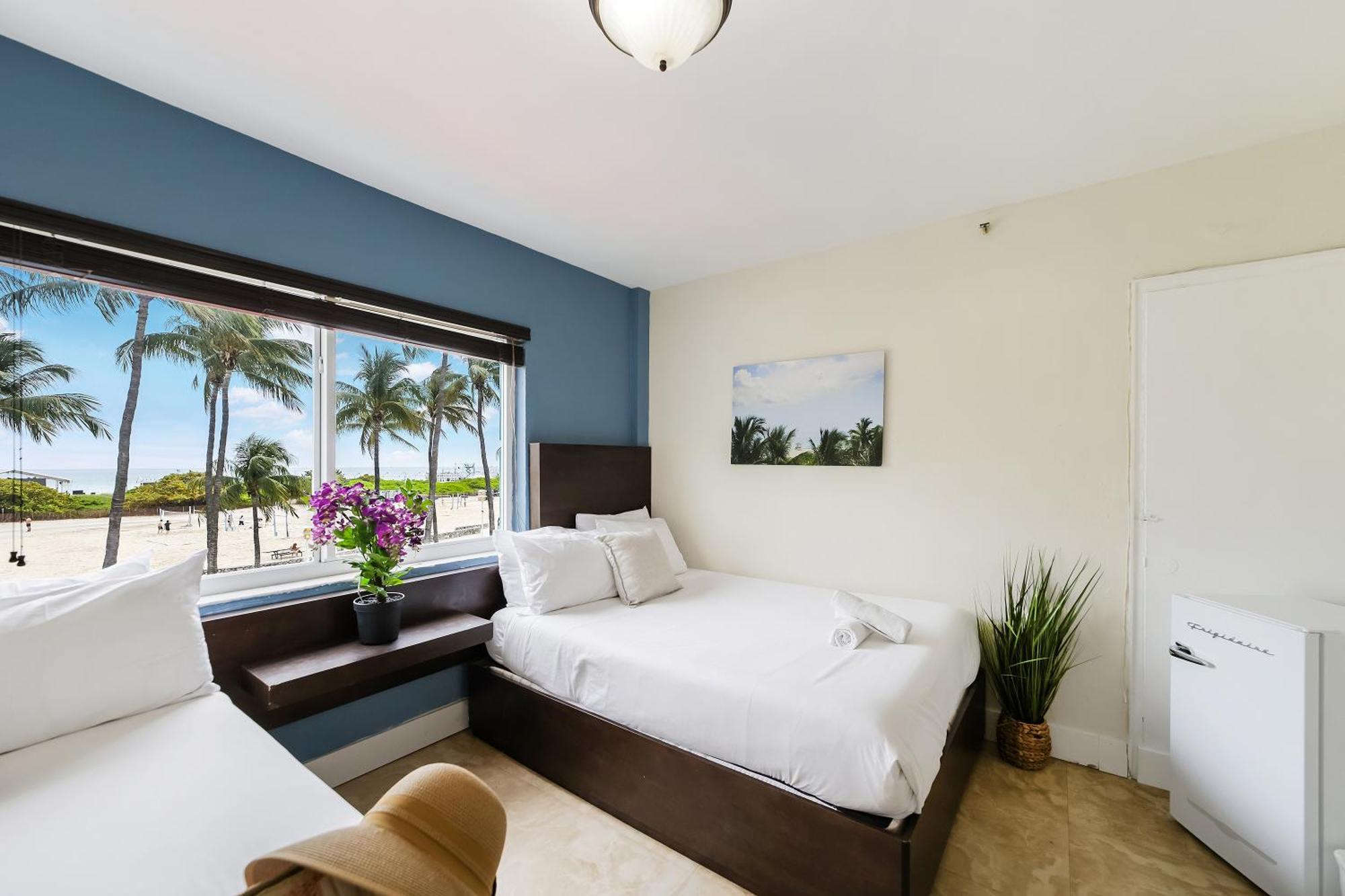 Deluxe Room Two double Beds Suite Ocean View Self Check