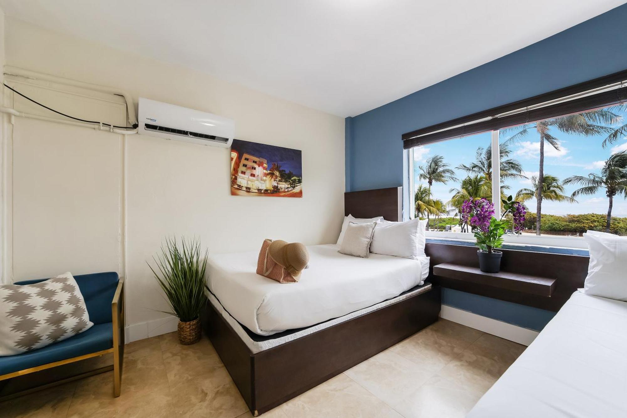 Deluxe Room Two double Beds Suite Ocean View Self Check