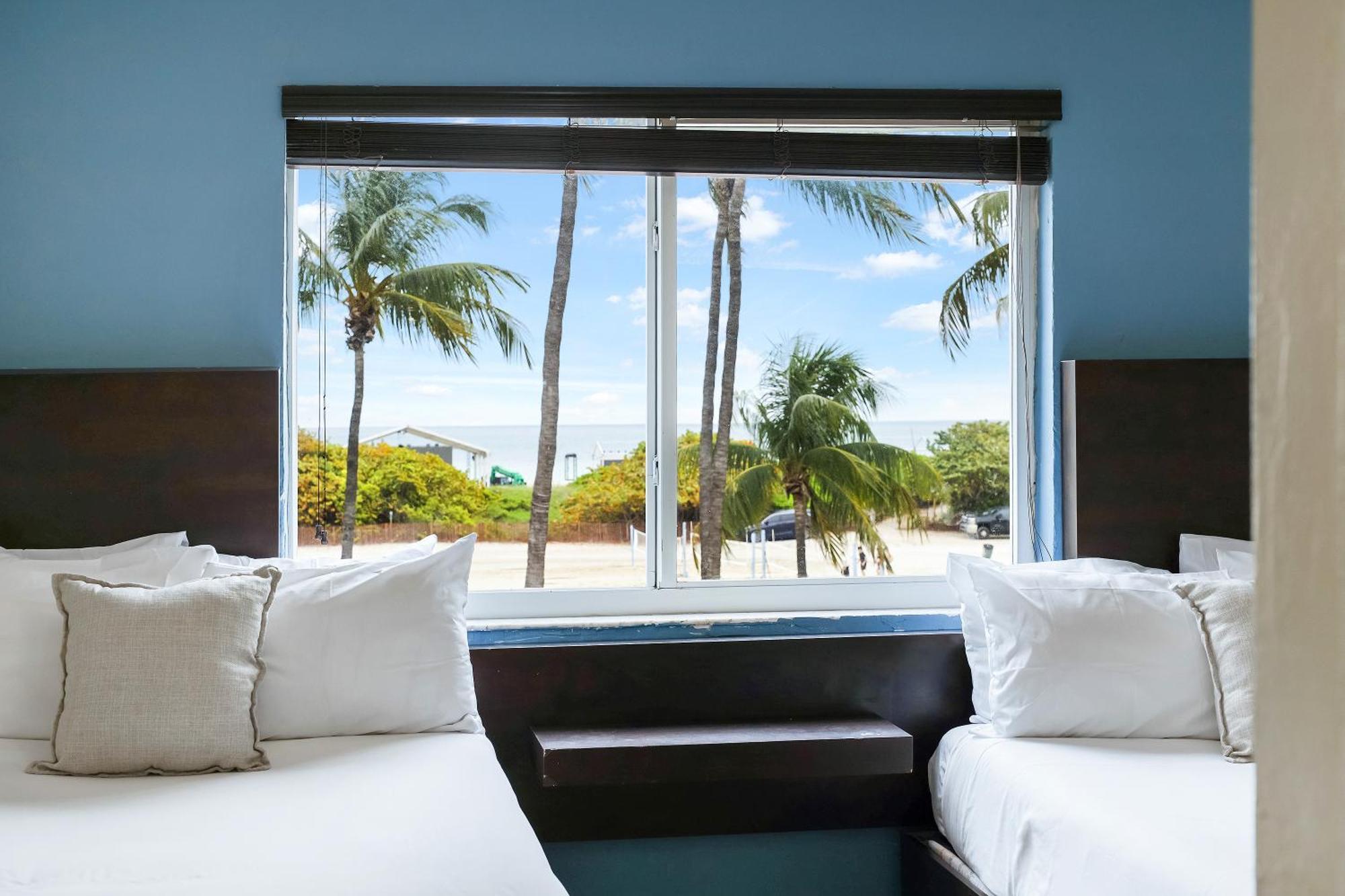 Deluxe Room Two double Beds Suite Ocean View Self Check